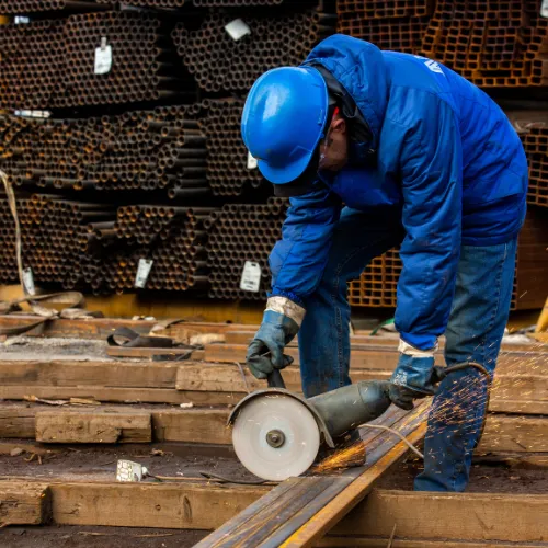 a man cutting metal